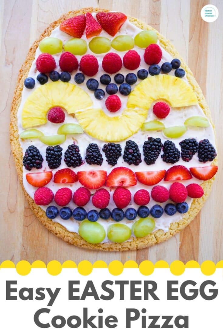 title "Easy EASTER Egg fruit platter" close up image of Easter egg cookie pizza