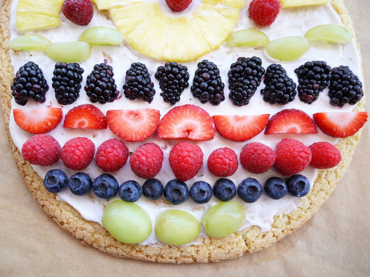 close up of fruit placed on easter fruit cookie pizza