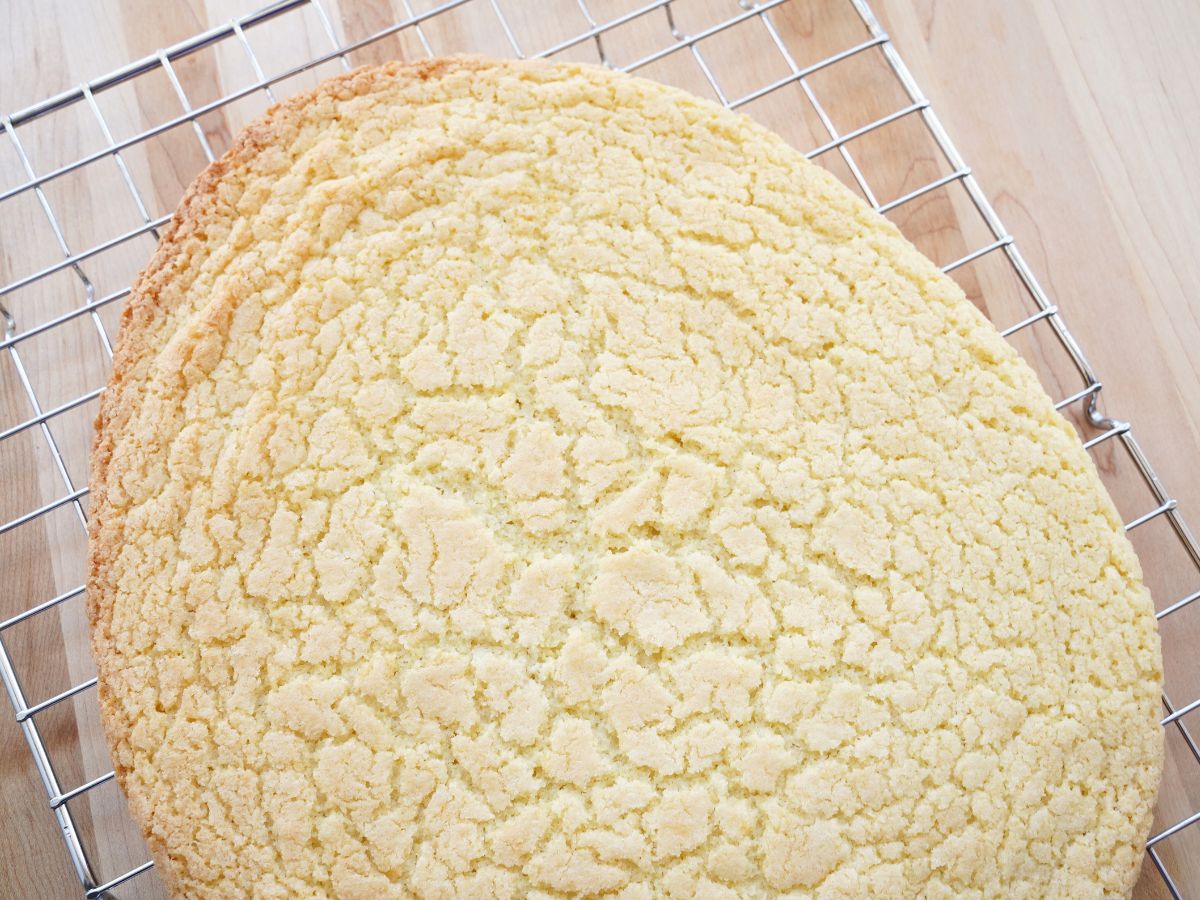 easter egg shaped sugar cookie on cooling rack