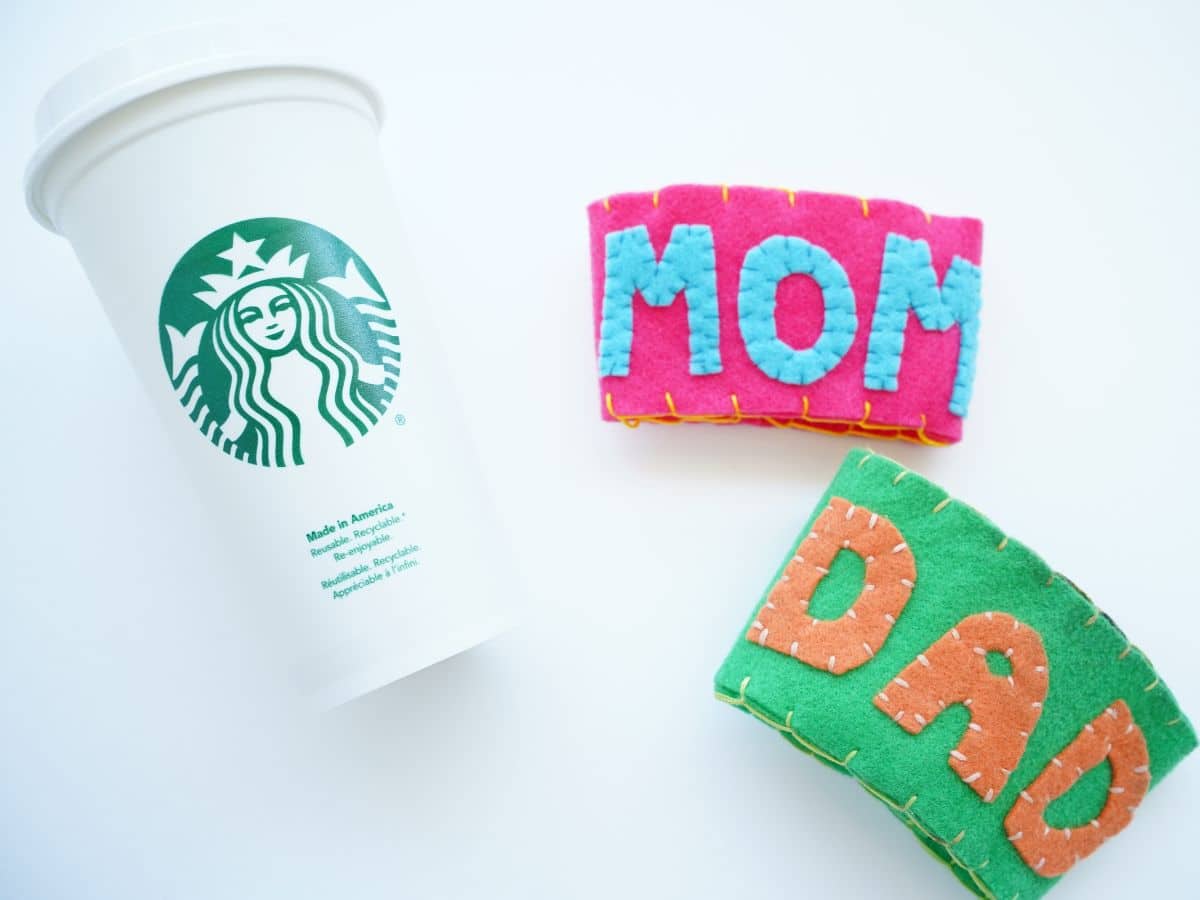 mom and dad diy coffee cup sleeves with white reusable starbucks cup