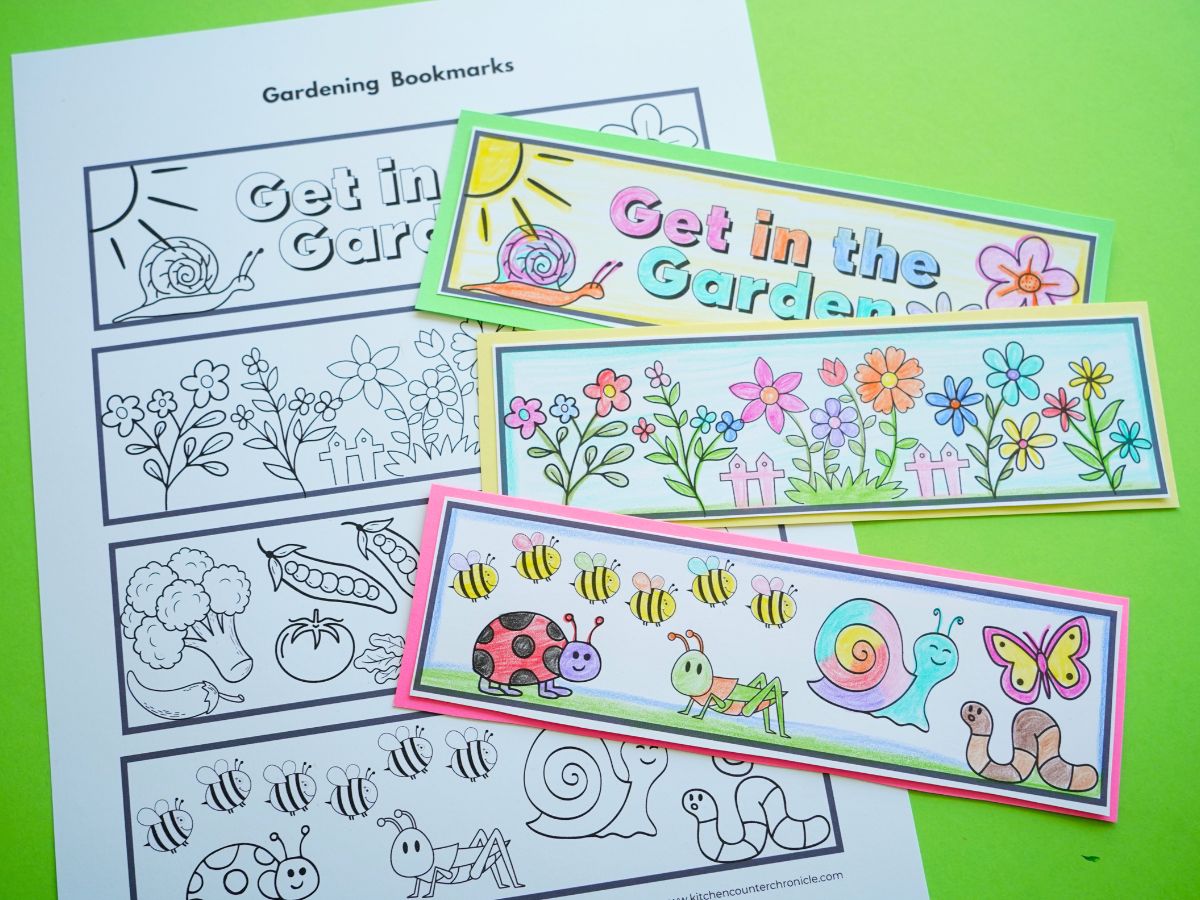 printable sheet of garden bookmarks with 3 colored garden bookmarks piled on top