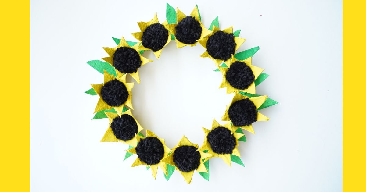 egg carton sunflower wreath on table