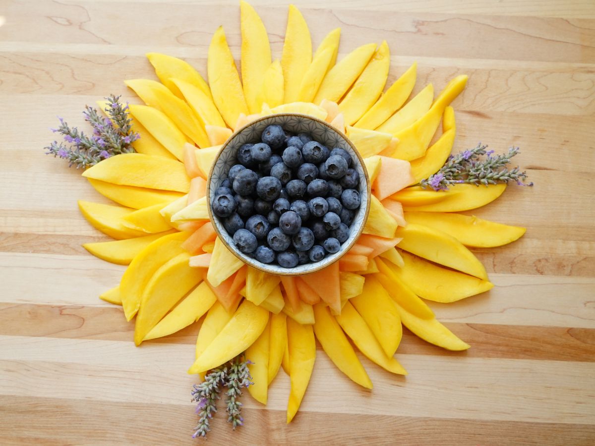 fruit sunflower fruit tray on wooden tray