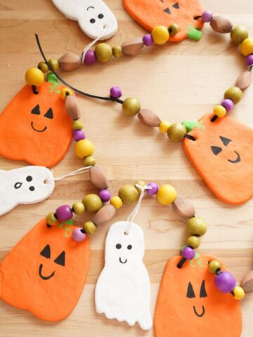 easy salt dough halloween garland with ghosts and pumpkins and wooden beads