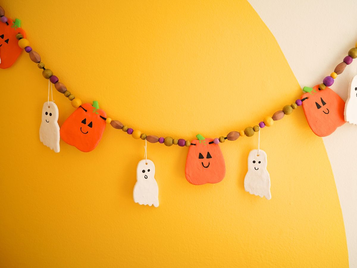 salt dough halloween garland hanging on wall