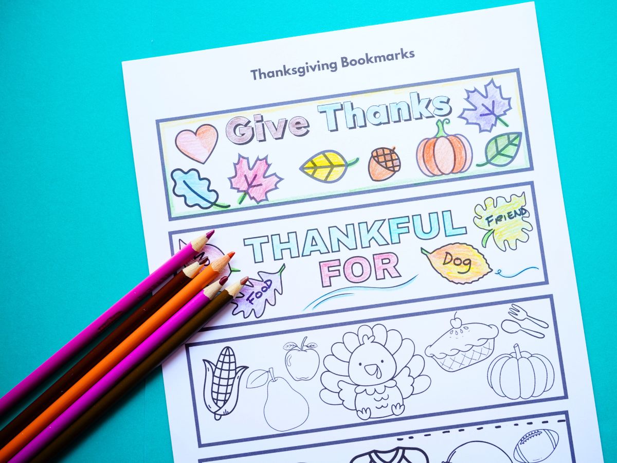 print out of sheet of thanksgiving bookmarks on cardstock with pencil crayons on top