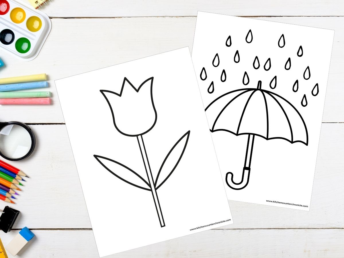 print out of tulip template and rainy umbrella template for zentangle on desktop with craft supplies