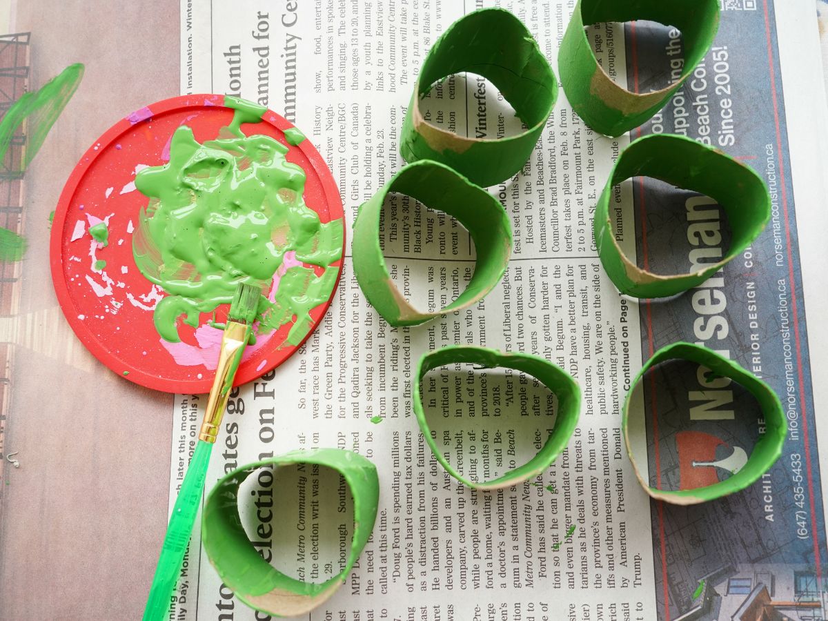 toilet roll hearts for clover painted green with paintbrush