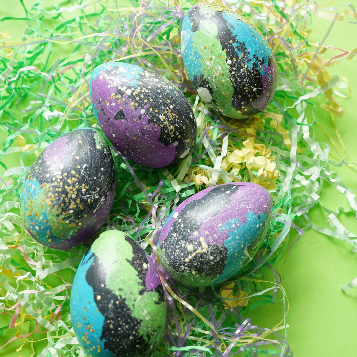 5 galaxy eggs nested in easter grass featured image