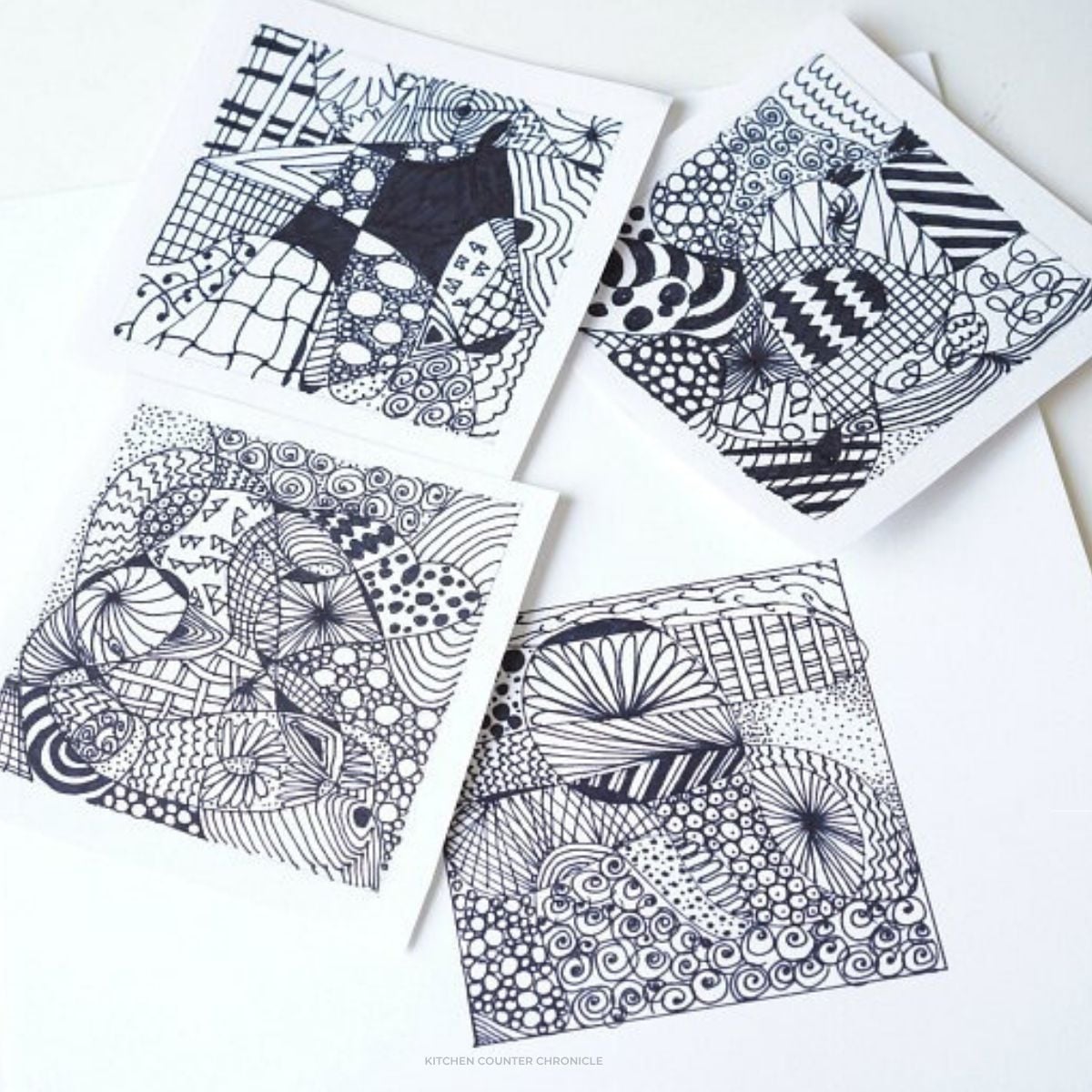 beginner's guide to zentangle art with 4 squares filled with zentangle patterns