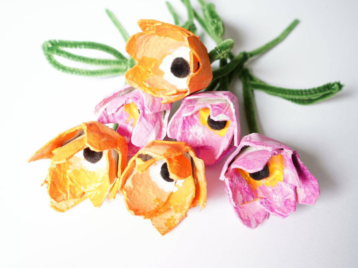 close up of bouquet of pink and orange egg carton tulips with pipe cleaner stems