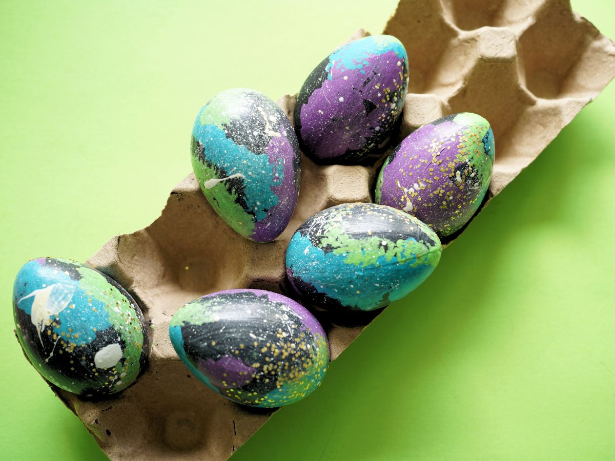 egg carton filled with outer space easter eggs
