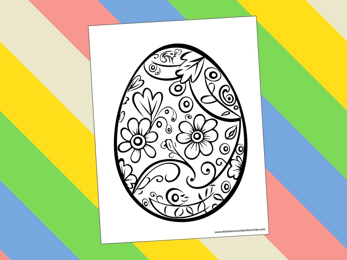 print out of Easter colouring sheet with easter egg filled with flower zentangle designs