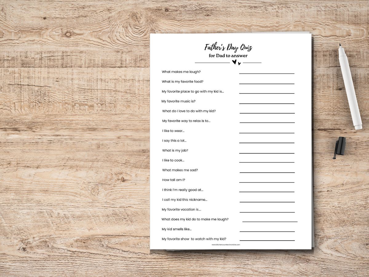 father's day quiz for dad to answer printed out and on table with pen