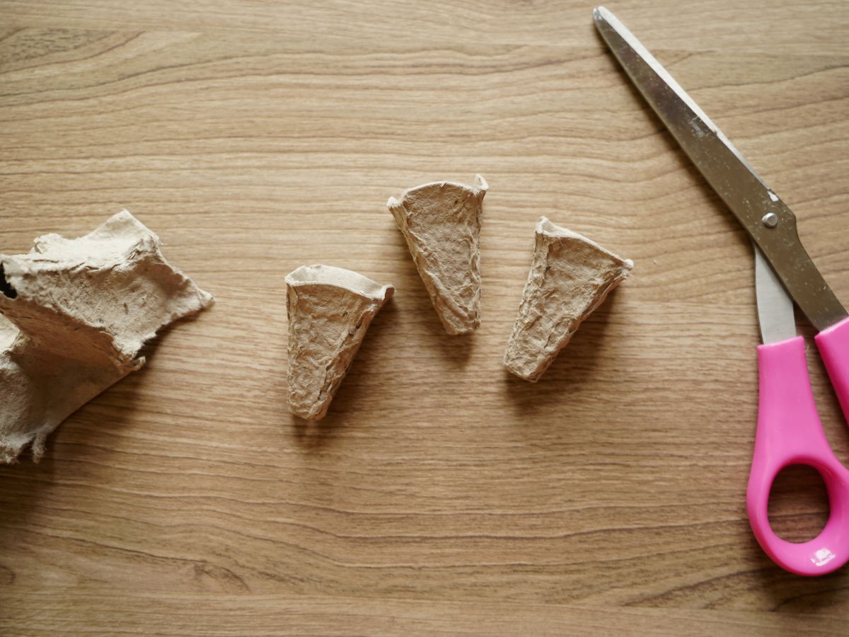 3 egg carton ice cream cones unpainted on table