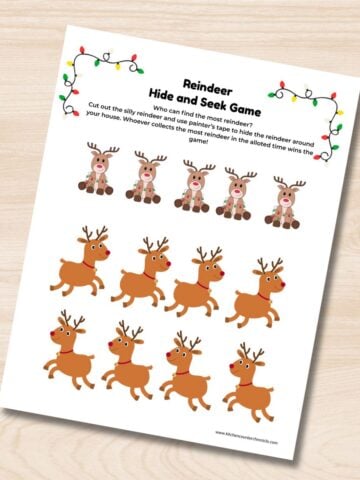 print out of reindeer hide and seek game for kids on table featured image