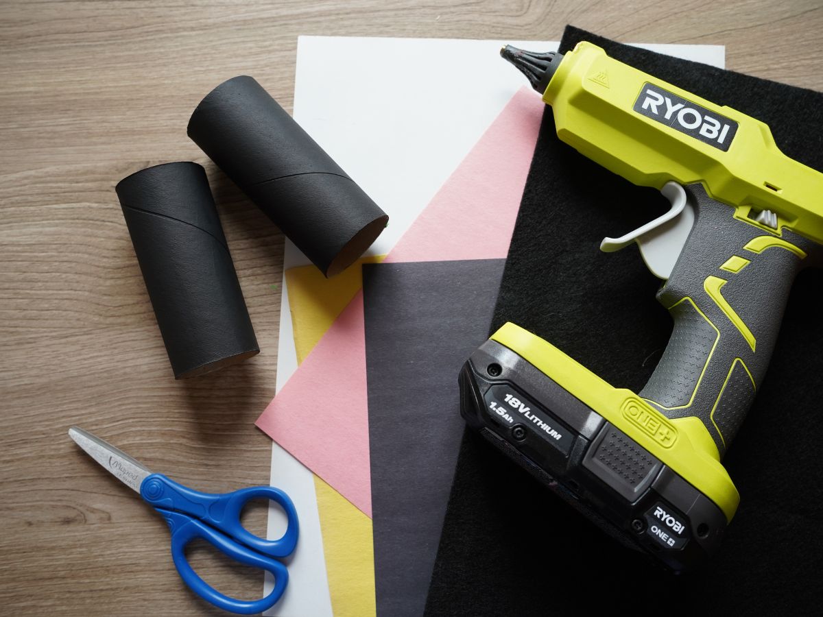 craft supplies for toilet roll black cat - glue gun, scissors, construction paper
