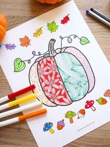 featured image of print out of pumpkin template with zentangle doodles drawn inside