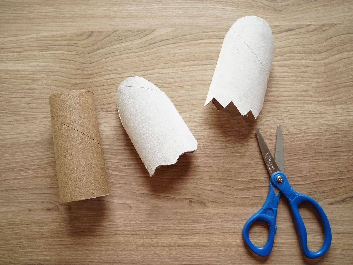 toilet paper roll cut into shape of ghost