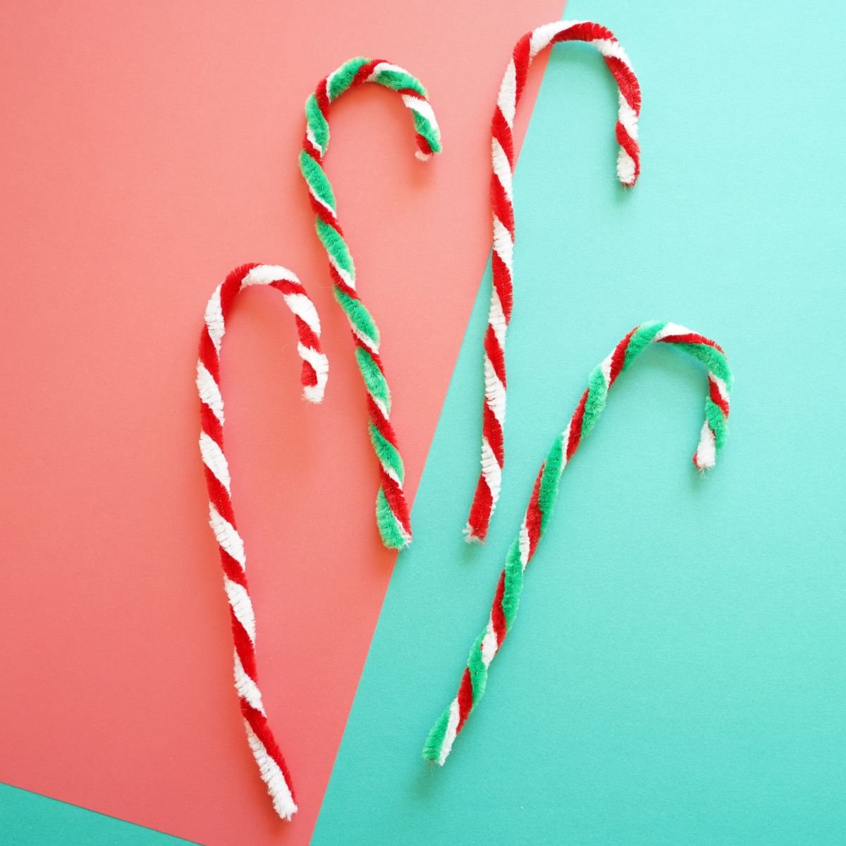 4 pipe cleaner candy canes on table