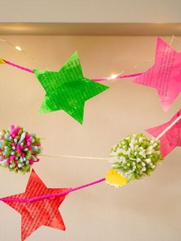 close up of star paper chain hanging