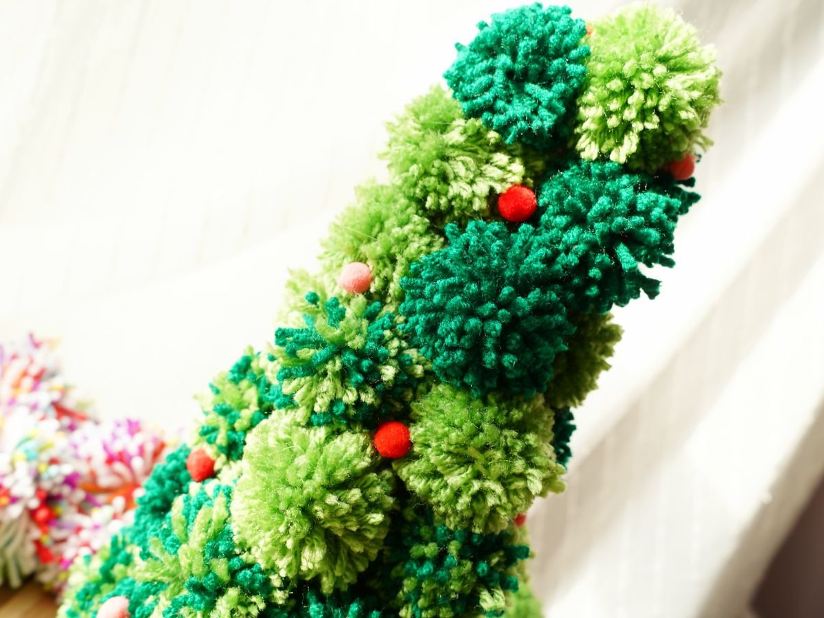 close up top of DIY pom pom christmas tree