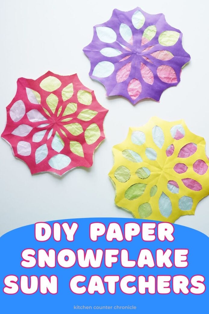 diy paper snowflake sun catchers with title pin