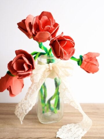 vase filled with pink diy egg carton roses