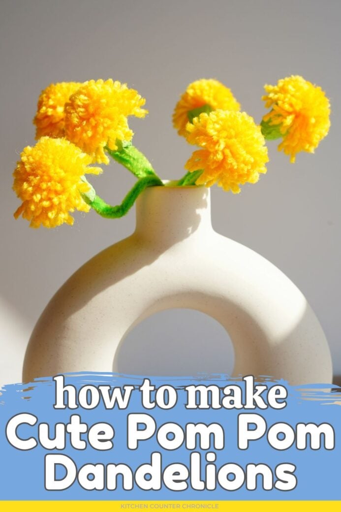 white vase filled with bouquet of pom pom dandelions with title how to make cute pom pom dandelion flower craft