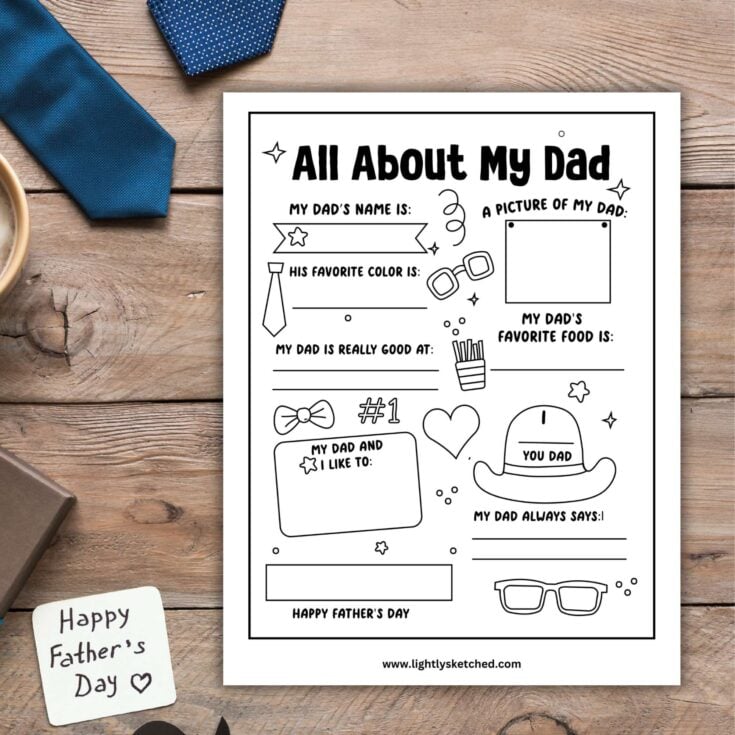print out of all about Dad worksheet sitting on wooden table