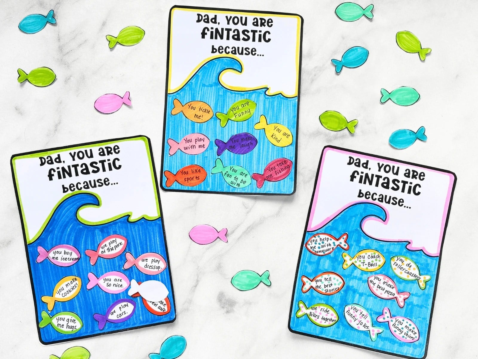Father's day cards with little fish and messages written by kids