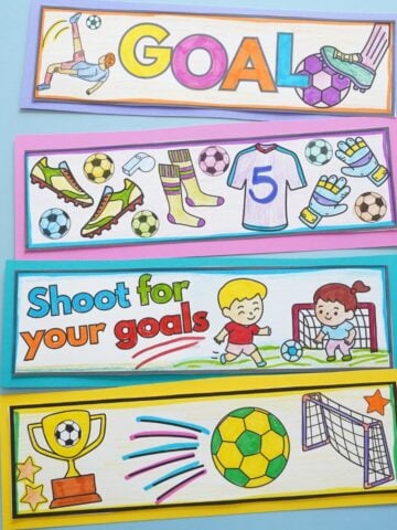 4 colored soccer bookmarks on blue table