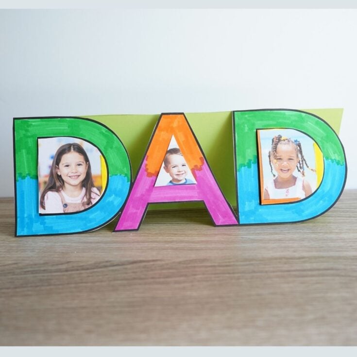 featured image with DIY DAD picture frame craft project sitting on table