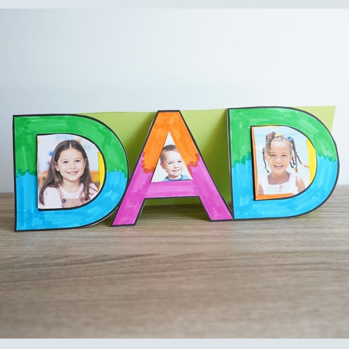 featured image with DIY DAD picture frame craft project sitting on table