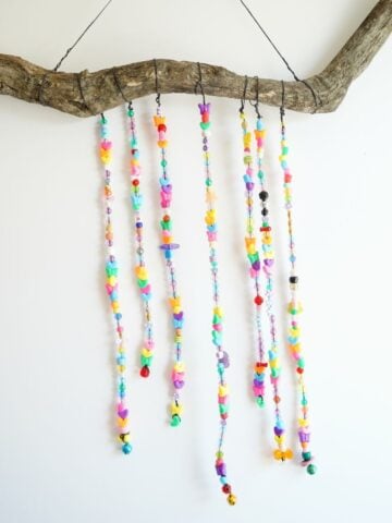 final hanging beaded wind chime hanging on wall inside for featured image