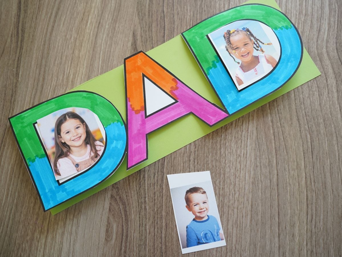 photos of kids being cut out and taped into the father's day picture frame